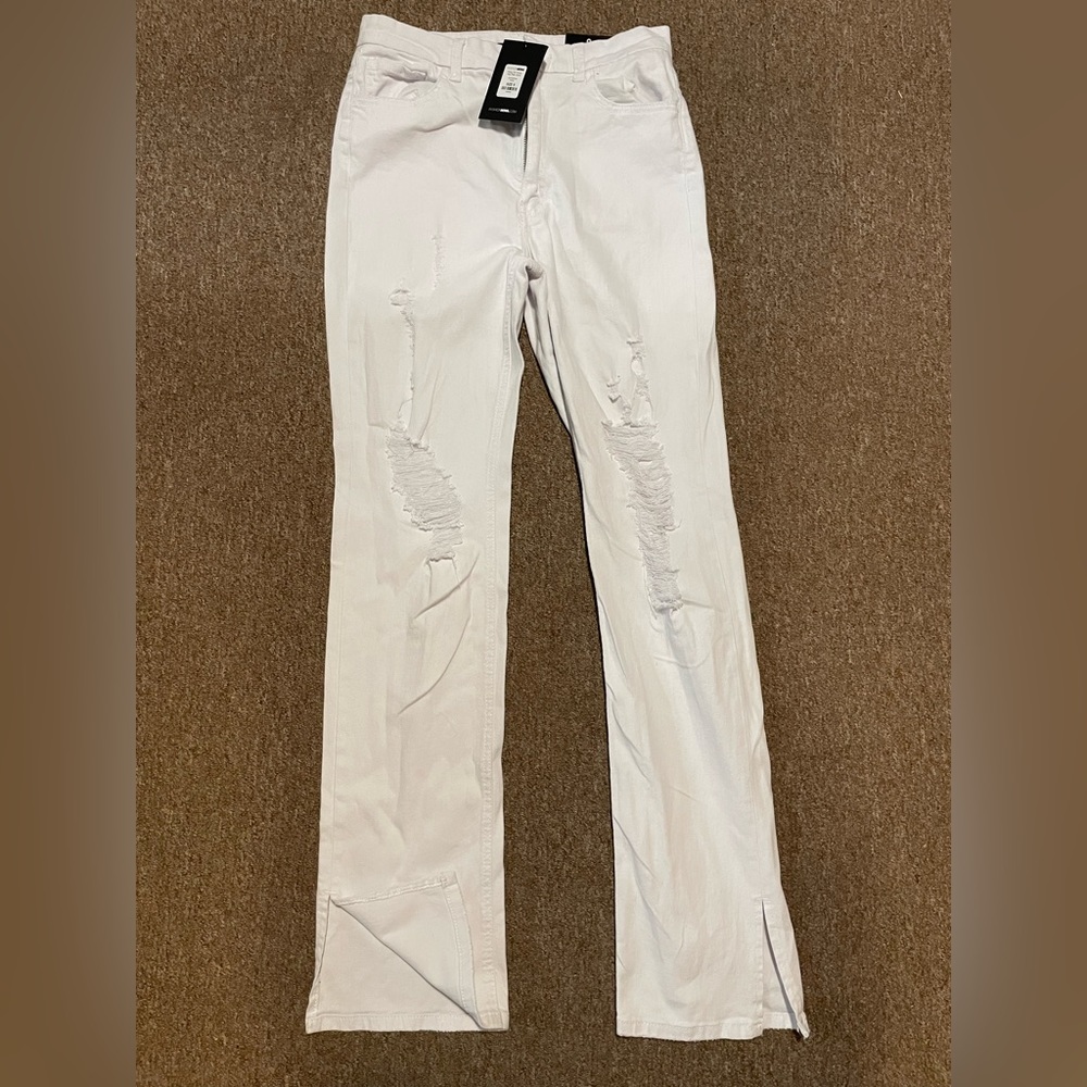 White Flare Jeans With Rips